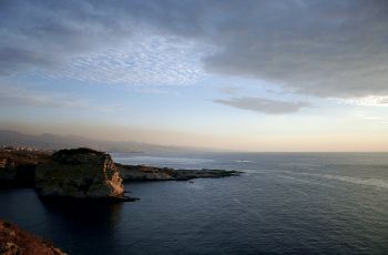 Featured is a photo of the sun setting in Beirut, Lebanon ... photographer unknown.